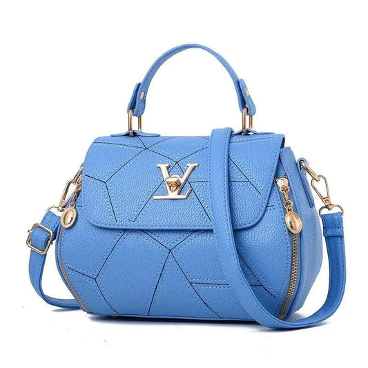 Elegant leather tote bag by MANDOTOS with sturdy handles and sleek design, perfect for everyday use.