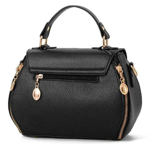 Elegant leather tote bag by MANDOTOS featuring a sleek design and sturdy handles, perfect for everyday use.