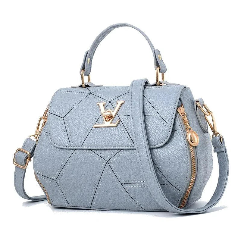Elegant leather tote bag by MANDOTOS with sturdy handles and spacious interior, perfect for stylish everyday use.