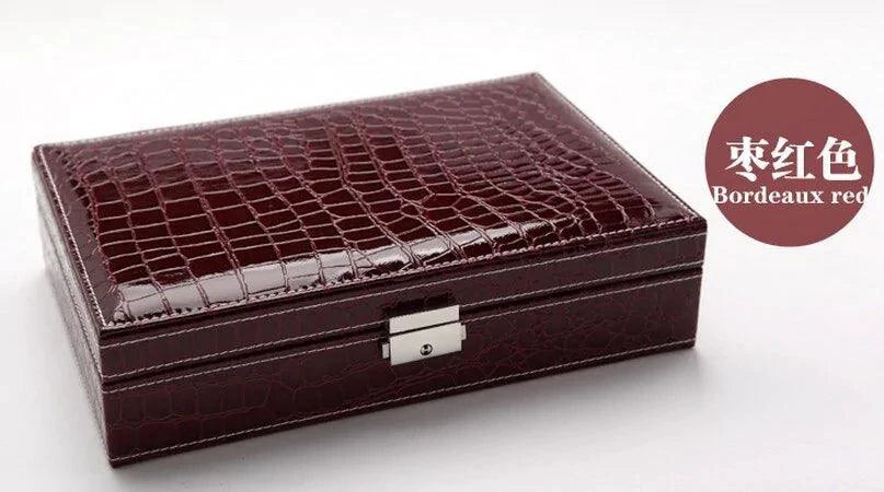 Elegant leather vanity case by MANDOTOS with a classic design, featuring a polished finish and secure clasp for travel and storage.