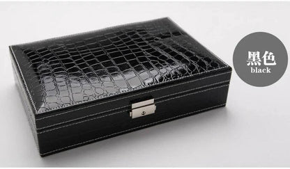 Elegant leather vanity case by MANDOTOS with a sleek design and multiple compartments for cosmetics and personal items.