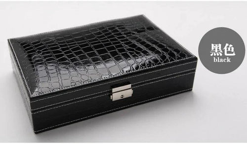 Elegant leather vanity case by MANDOTOS with a sleek design and multiple compartments for cosmetics and personal items.