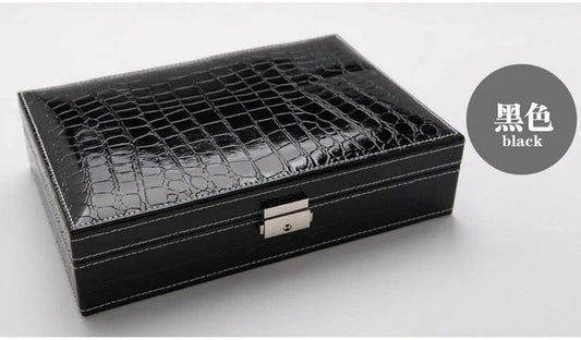 Elegant leather vanity case by MANDOTOS with a sleek design and multiple compartments for cosmetics and personal items.