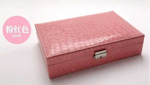 Elegant leather vanity case by MANDOTOS with a sleek, stylish design and compact size for travel and organization.
