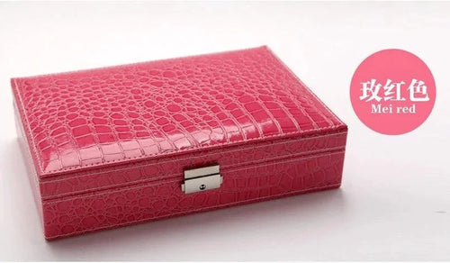 Elegant leather vanity case by MANDOTOS with a structured design and zipper closure, perfect for organizing beauty essentials.