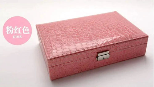 Elegant leather vanity case by MANDOTOS with a sleek design, featuring a compact shape and quality leather finish.
