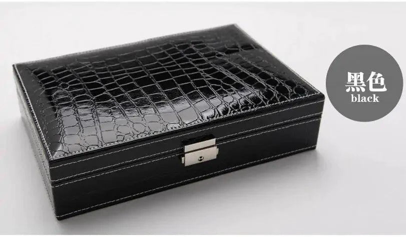 Elegant leather vanity case by MANDOTOS with a sleek design, featuring a secure clasp and spacious interior for cosmetics and accessories.