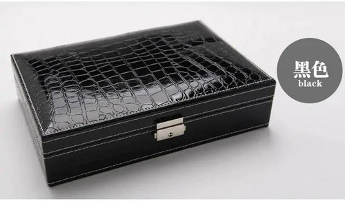 Elegant leather vanity case by MANDOTOS with a sleek design, featuring a secure clasp and spacious interior for cosmetics and accessories.