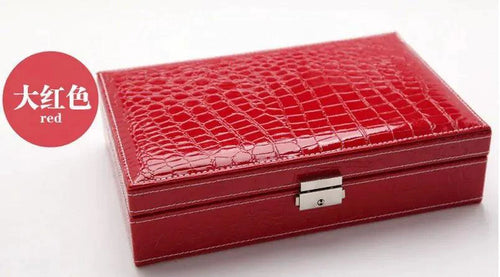 Elegant leather vanity case by MANDOTOS with a classic design and brass hardware, perfect for travel and daily use.