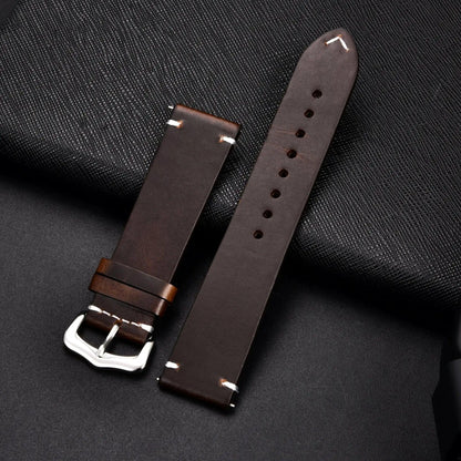 Elegant leather watch band by MANDOTOS featuring smooth dark brown leather and silver buckle closure.