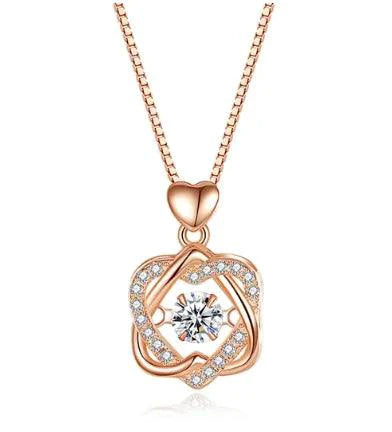 Elegant rose gold heart necklace by MANDOTOS featuring a delicate chain and a polished heart pendant.