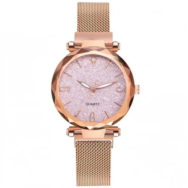 Elegant rose gold MANDOTOS timepiece with a sleek round dial and minimalist design, displayed on a white background.