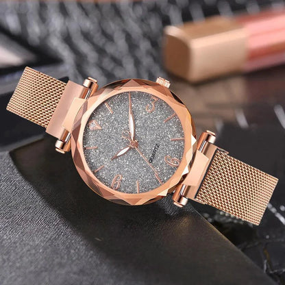 Elegant rose gold MANDOTOS timepiece with a sleek design and minimalist dial, displayed on a white background.