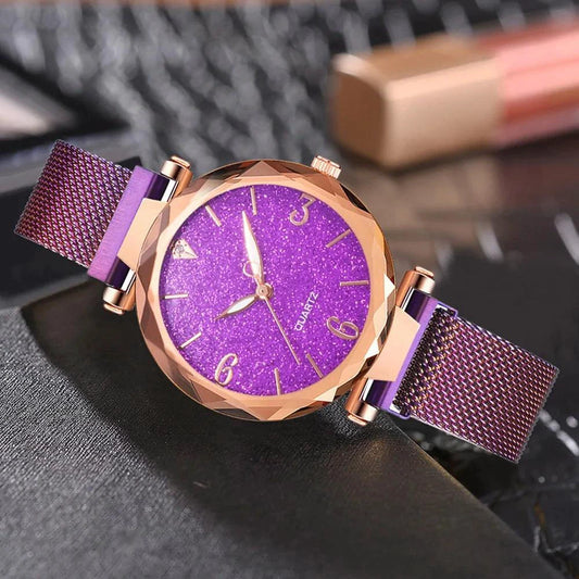 Elegant rose gold MANDOTOS timepiece with a sleek round dial and metal bracelet, showcasing sophisticated luxury watch design.