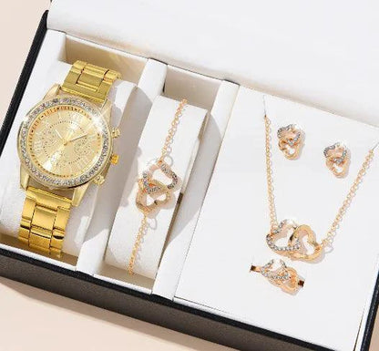 Elegant rose gold watch ensemble by MANDOTOS featuring a stylish watch with matching accessories on a neutral background.