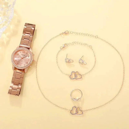 Rose gold watch ensemble by MANDOTOS featuring a stylish watch, matching bracelet, and elegant accessories on a neutral background.