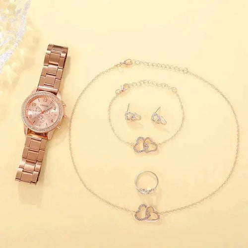 Rose gold watch ensemble by MANDOTOS featuring a stylish watch, matching bracelet, and elegant accessories on a neutral background.