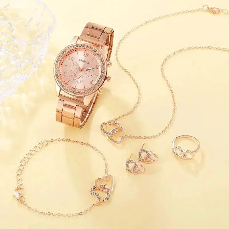 Elegant rose gold watch ensemble by MANDOTOS featuring a stylish watch with matching bracelet on a white background.