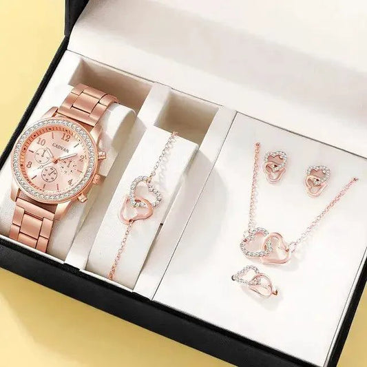 Elegant rose gold watch ensemble by MANDOTOS featuring a stylish watch, bracelet, and accessories on a neutral background.