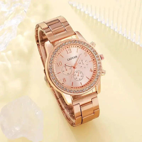 Elegant rose gold watch ensemble by MANDOTOS featuring a stylish watch with a matching bracelet and accessories.