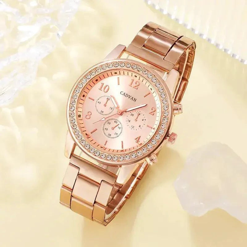 Elegant rose gold watch ensemble by MANDOTOS featuring a stylish timepiece with matching accessories on a neutral background.