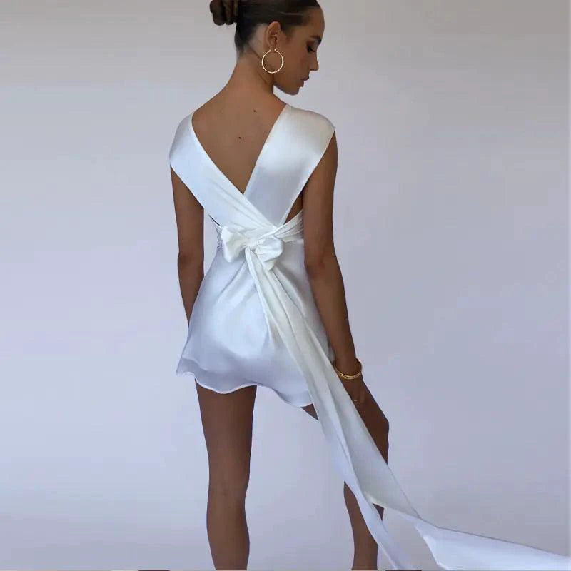 Elegant sleeveless dress by MANDOTOS featuring a stylish design, perfect for formal or casual occasions.