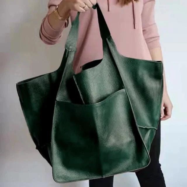 Elegant women's tote bag by MANDOTOS featuring a sleek design and spacious interior for everyday use.