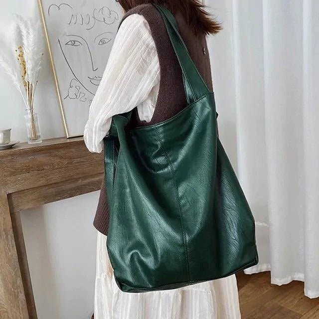 Elegant women's tote bag by MANDOTOS with sleek design and spacious interior, perfect for daily use and stylish accessories.