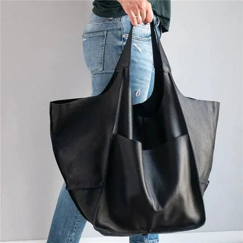 Elegant women's tote bag by MANDOTOS, featuring a stylish design with sturdy handles and spacious interior for everyday use.