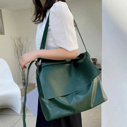 Elegant women's tote bag by MANDOTOS featuring a stylish design with spacious interior and sturdy handles.