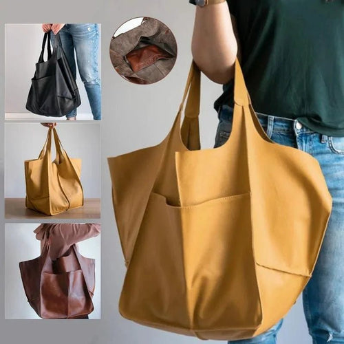Elegant women's tote bag by MANDOTOS featuring a spacious design, sturdy handles, and stylish look for everyday use.