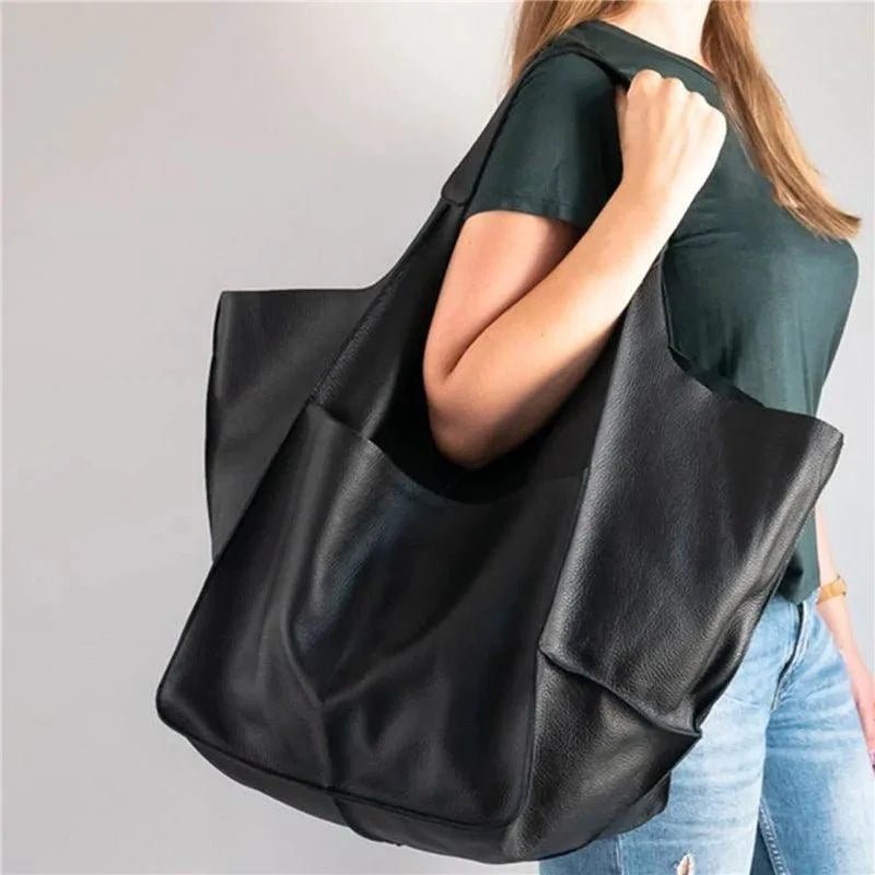 Elegant women's tote bag by MANDOTOS, featuring a stylish design with sturdy handles and spacious interior.