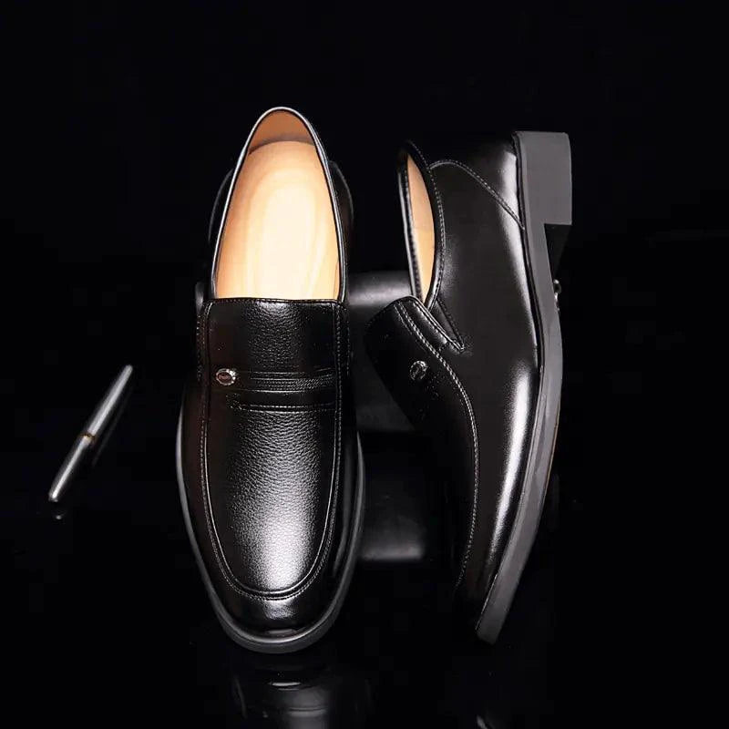 Mandotos Elite leather dress shoes featuring sleek black design and polished finish, ideal for formal or professional wear.