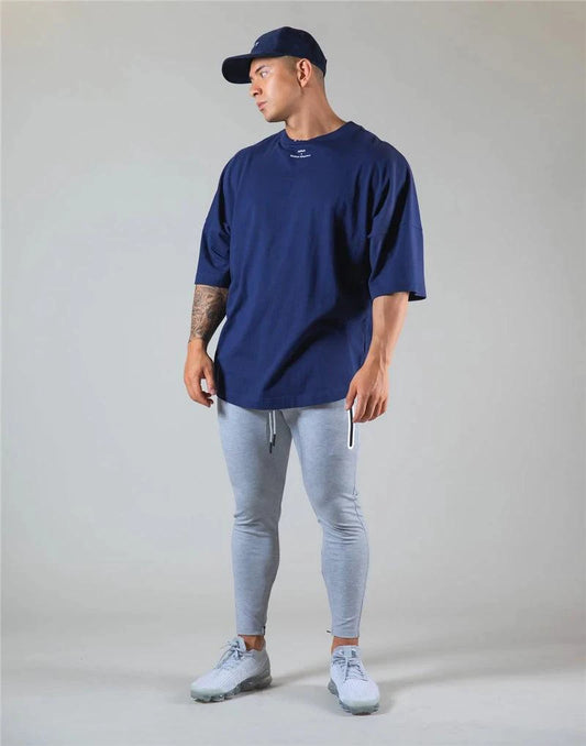 Mandotos Japan&UK cotton shirt for gym, white athletic t-shirt with logo, comfortable fit, ideal for workout and active wear.