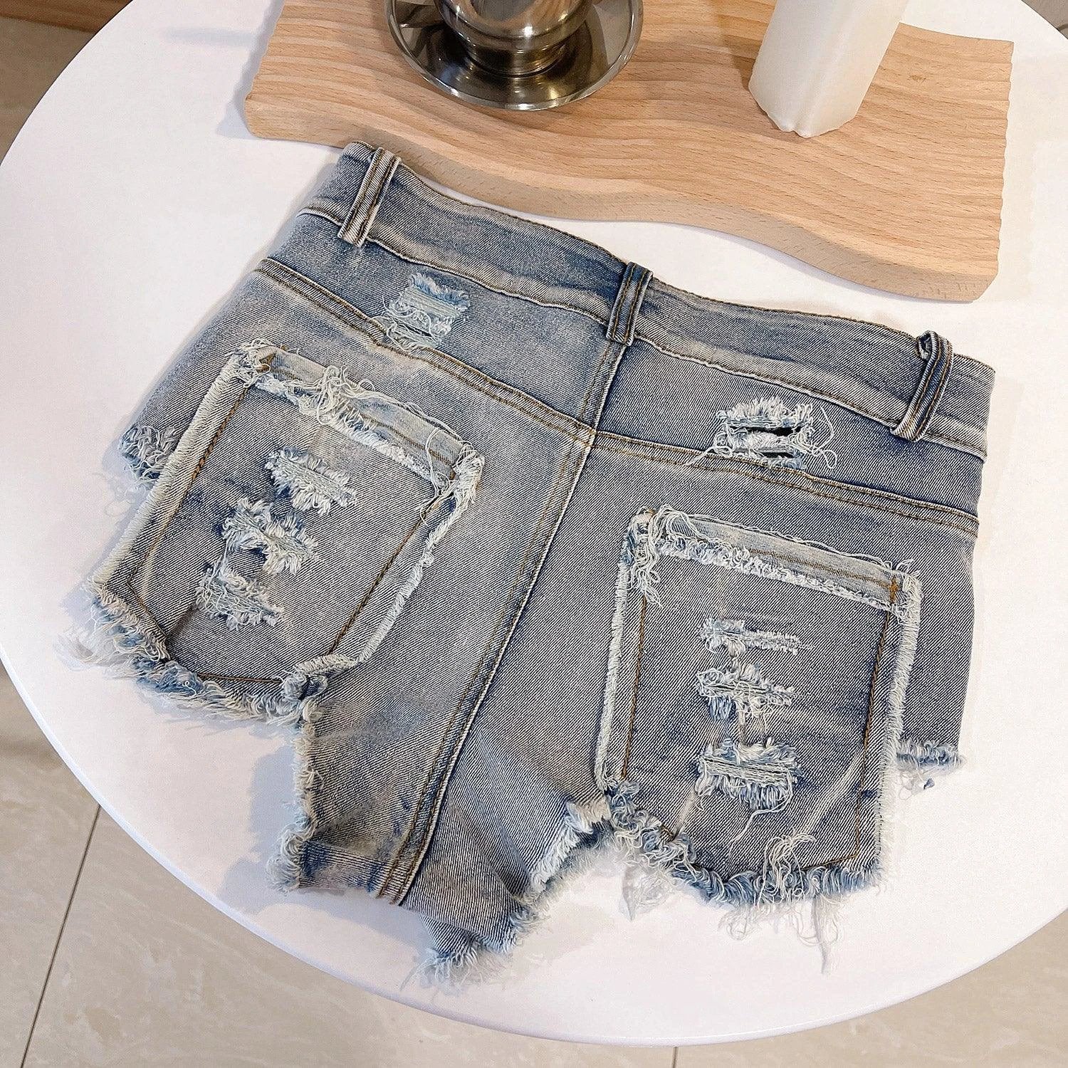 Light-colored high waist raw hem jeans by MANDOTOS, European Chic style, showcasing fit and raw hem detail.