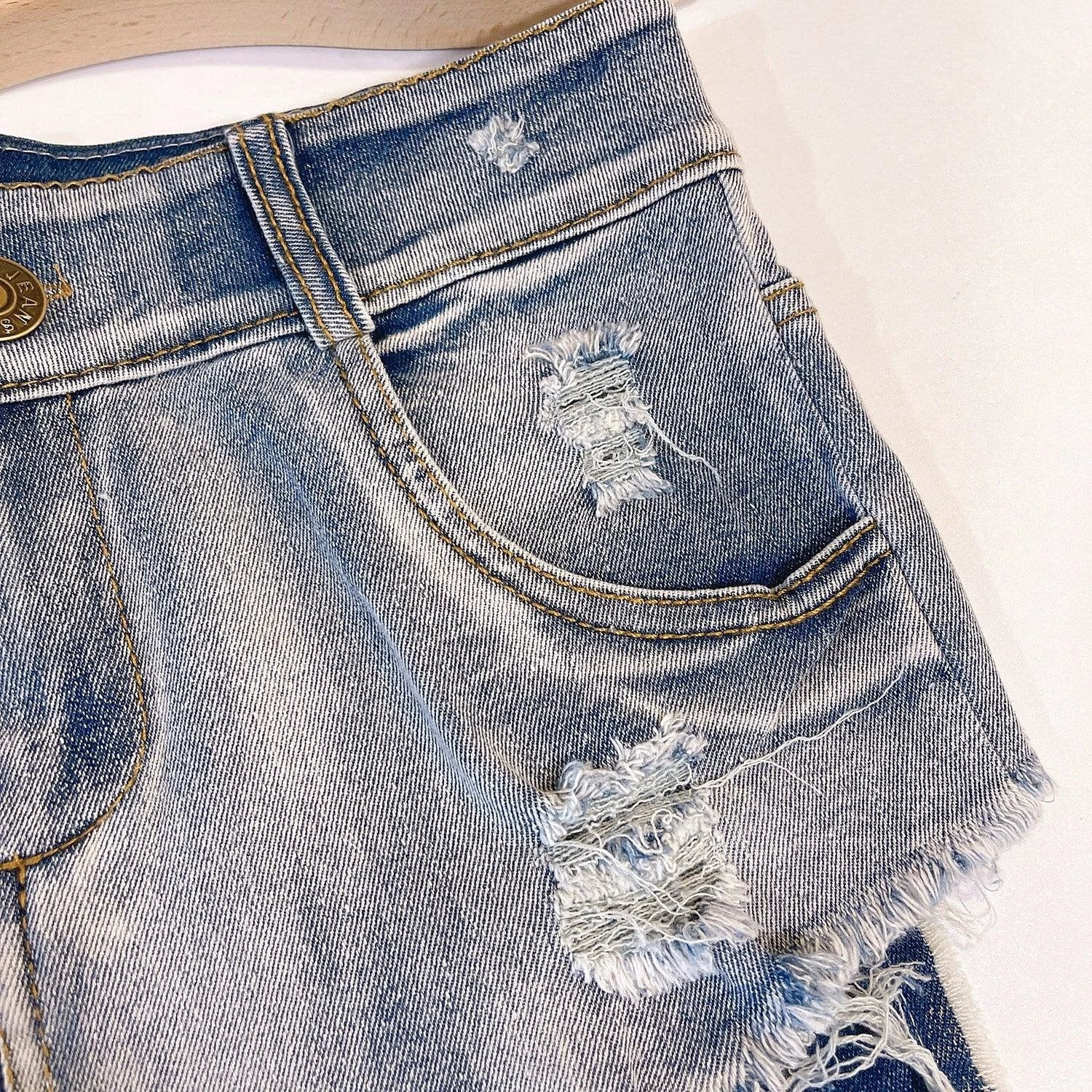European Chic high waist raw hem jeans by MANDOTOS, light-colored denim with stylish distressed raw hems and classic fit.