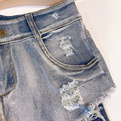 European Chic high waist raw hem jeans by MANDOTOS, light-colored denim with stylish distressed raw hems and classic fit.