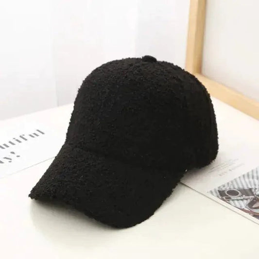 Mandotos fall-style baseball hat featuring a classic design with warm autumn colors and a curved brim.