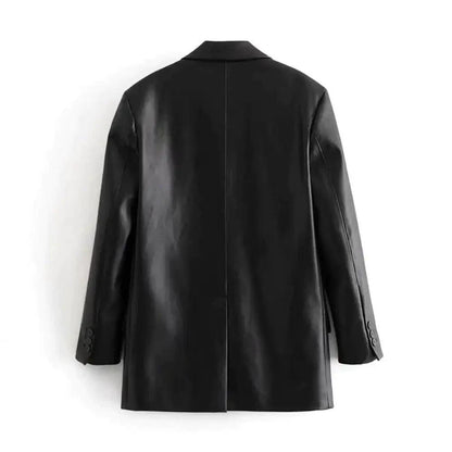 Mandotos Farah faux leather blazer featuring a tailored fit, lapel collar, and sleek black finish on a model.