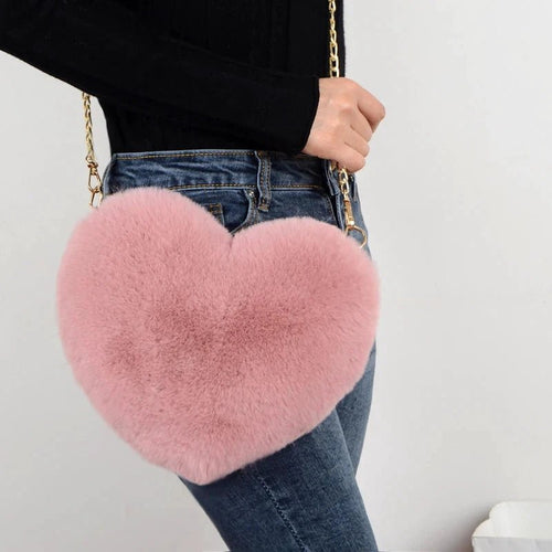 Mandotos women's heart-shaped faux fur crossbody handbag with plush fabric, chain strap, and soft shoulder design.