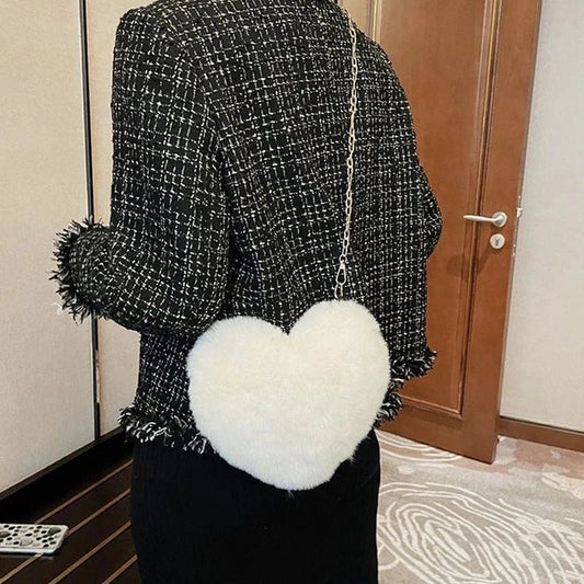 Mandotos women's heart-shaped faux fur crossbody bag with plush texture, chain strap, soft shoulder design, perfect for stylish shoppers.