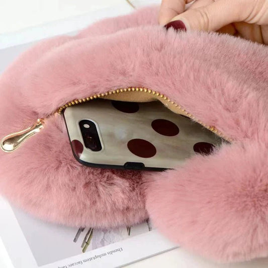 Fashion women's heart-shaped faux fur crossbody handbag by MANDOTOS featuring soft plush material and chain shoulder strap.