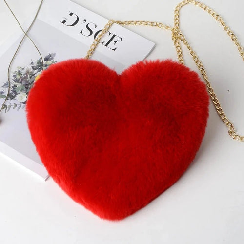 Mandotos women's heart-shaped faux fur crossbody handbag with plush soft chain strap and tote style for casual or evening wear.