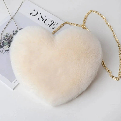 Mandotos women's heart-shaped faux fur crossbody bag with plush material and chain shoulder strap, perfect for stylish casual outings.