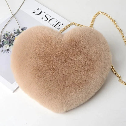 Mandotos women's heart-shaped faux fur crossbody bag with plush texture and chain shoulder strap, ideal for stylish shopper totes.