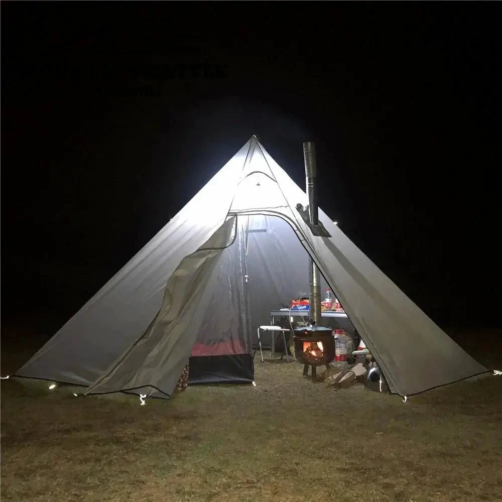 Mandotos Featherlight Pyramid Camp Shelter set up outdoors, showcasing lightweight, durable fabric and pyramid shape for camping shelter.