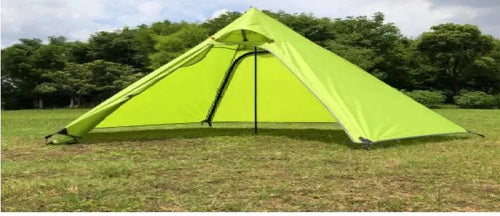 Mandotos Featherlight Pyramid Camp Shelter set up outdoors, showcasing lightweight, durable camping shelter with open sides and rain cover