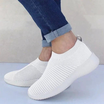 Mandotos flat knitted shoes with a soft, stretchy fabric upper and comfortable slip-on design for casual wear.