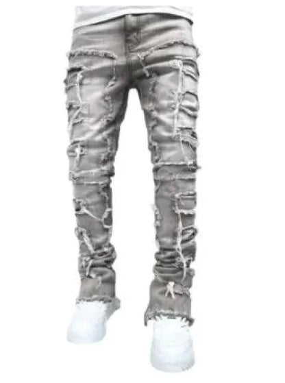 Mandotos FlexiStyle denim jeans showing classic five-pocket design and slim fit style in dark blue denim fabric.