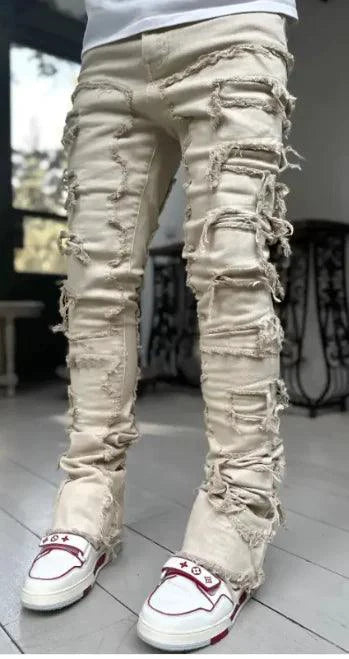 Mandotos FlexiStyle denim jeans, slim fit with classic five-pocket design and distressed detailing, on a model.